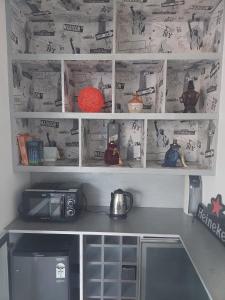 Kuchyň nebo kuchyňský kout v ubytování Terrace abode