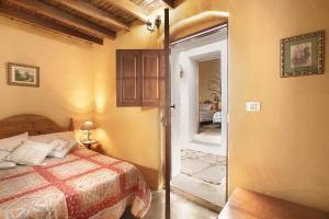 En eller flere senge i et værelse på Casa Rural Madre Nieves