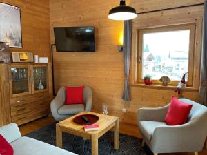 Telewizja i/lub zestaw kina domowego w obiekcie Apartment Jochblick by Interhome