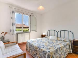 A bed or beds in a room at Holiday Home Wendy by Interhome