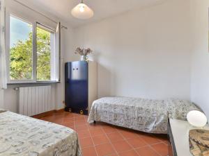 A bed or beds in a room at Holiday Home Wendy by Interhome