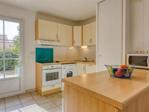 Η κουζίνα ή μικρή κουζίνα στο Holiday Home Les Grandes Bleues 3-1 by Interhome +21 φωτογραφίες