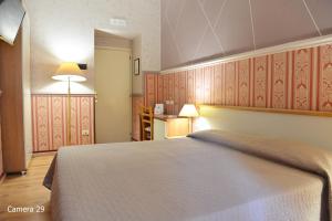 Posteľ alebo postele v izbe v ubytovaní Catania Centro Rooms