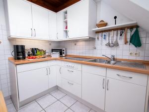 Η κουζίνα ή μικρή κουζίνα στο Apartment Meerblick by Interhome