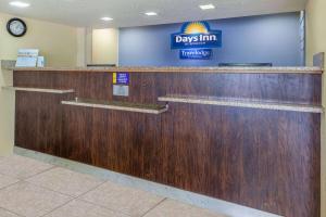a reception desk in a days inn hotel at Travelodge by Wyndham Charles Town - Harpers Ferry in Charles Town