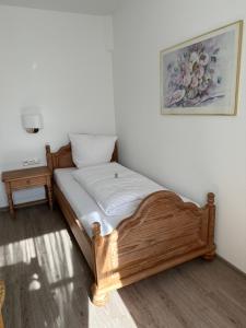 Postel nebo postele na pokoji v ubytování Hotel Wittekindsquelle