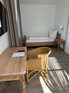 Postel nebo postele na pokoji v ubytování Hotel Wittekindsquelle