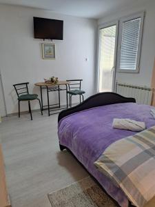 Posteľ alebo postele v izbe v ubytovaní Bed&Breakfast Đurđan