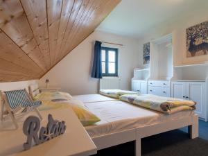 Posteľ alebo postele v izbe v ubytovaní Holiday Home Holiday Hill 42 by Interhome