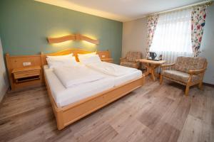 Postel nebo postele na pokoji v ubytování Landgasthof Hanselewirt