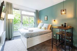 Postel nebo postele na pokoji v ubytování City Center Flat 1 - Hypercentre - Jean Jaurès - Wifi