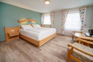 Postel nebo postele na pokoji v ubytování Landgasthof Hanselewirt