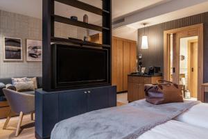 Kuchyň nebo kuchyňský kout v ubytování Löwen Hotel Montafon