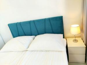 Postel nebo postele na pokoji v ubytování Pokoje Lejla