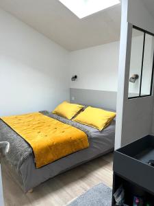 Posteľ alebo postele v izbe v ubytovaní La Maison de Lena 500m de la Plage