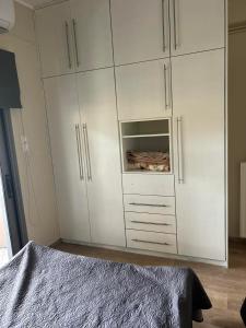 Postel nebo postele na pokoji v ubytování Alexandros