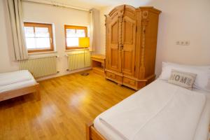 Postel nebo postele na pokoji v ubytování Landgasthof Hanselewirt