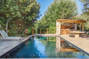 Bazén v ubytovaní Casa di l'olivu alebo v jeho blízkosti + 13 fotografií
