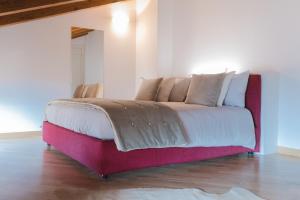 A bed or beds in a room at Casa Celeste