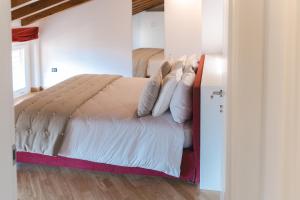 A bed or beds in a room at Casa Celeste