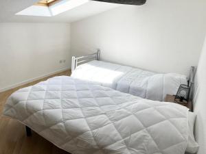 Postel nebo postele na pokoji v ubytování AS23183-P3 au coeur du Centre Ville - wifi - clim