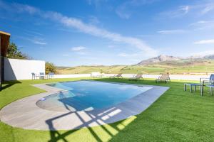 Bazén v ubytovaní Casa rural Paradise Holidays alebo v jeho blízkosti