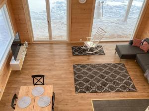 an overhead view of a living room with a couch and a table at Holiday Home Villa lehtoniemi by Interhome in Sonka