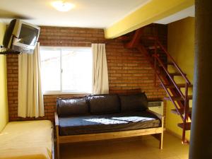 TV a/nebo společenská místnost v ubytování Apartments Fazenda Solares