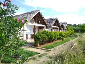 a row of houses with plants in front of them at SANJEELA-PLAGE COCO in Diego Suarez
