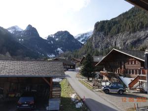 a view of a village with mountains in the background at Apartment Ferienwohnung Haltenboden by Interhome 