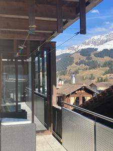 a balcony with a view of a mountain at Apartment Wildbach by Interhome in Adelboden