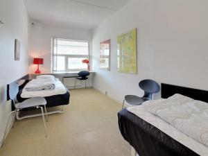 Postel nebo postele na pokoji v ubytování Apartment Milly - 100m from the sea in Western Jutland by Interhome
