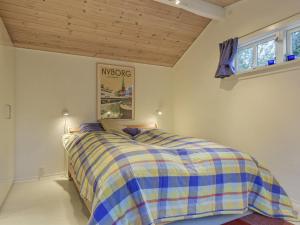 Postel nebo postele na pokoji v ubytování Holiday Home Ayla - 200m from the sea by Interhome