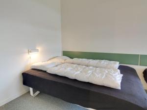 Postel nebo postele na pokoji v ubytování Apartment Kato - 100m from the sea in Western Jutland by Interhome