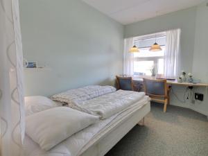 Postel nebo postele na pokoji v ubytování Apartment Ellenore - 100m from the sea in Western Jutland by Interhome