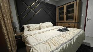 Кровать или кровати в номере Pavema Apartments