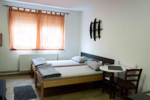 Posteľ alebo postele v izbe v ubytovaní Apartment Eurho