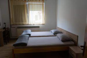 Posteľ alebo postele v izbe v ubytovaní Apartment Eurho
