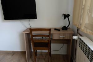 Televízia a/alebo spoločenská miestnosť v ubytovaní Apartment Eurho
