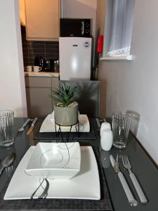 a kitchen with a table with a plant on it at Apt 3. Private Studio in Moseley, Birmingham in Birmingham