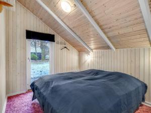 Holiday Home Hailka in SE Jutland by Interhome tesisinde bir odada yatak veya yataklar