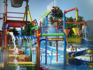 a water park with a water slide at Suite Latina - San Leonardo in Treviso