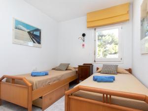 Posteľ alebo postele v izbe v ubytovaní Holiday Home Reserva V by Interhome