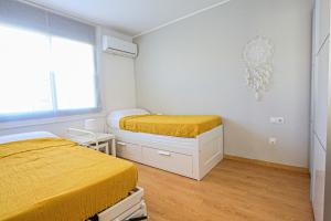 Postel nebo postele na pokoji v ubytování LITORAL COSTA DORADA - LAS TERRAZAS Only families + 37 fotografií