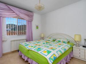 Postel nebo postele na pokoji v ubytování Holiday Home El Chaparral by Interhome