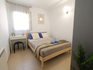 Posteľ alebo postele v izbe v ubytovaní Apartment Pedagrosa II by Interhome