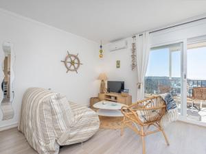 Televízia a/alebo spoločenská miestnosť v ubytovaní Apartment Casa Do by Interhome