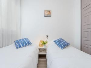 Posteľ alebo postele v izbe v ubytovaní Apartment Casa Do by Interhome