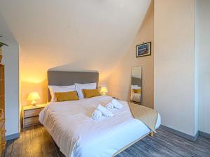 Łóżko lub łóżka w pokoju w obiekcie Holiday Home L'Armoricaine by Interhome
