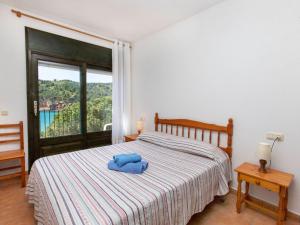 Postel nebo postele na pokoji v ubytování Holiday Home Port del Rei I by Interhome